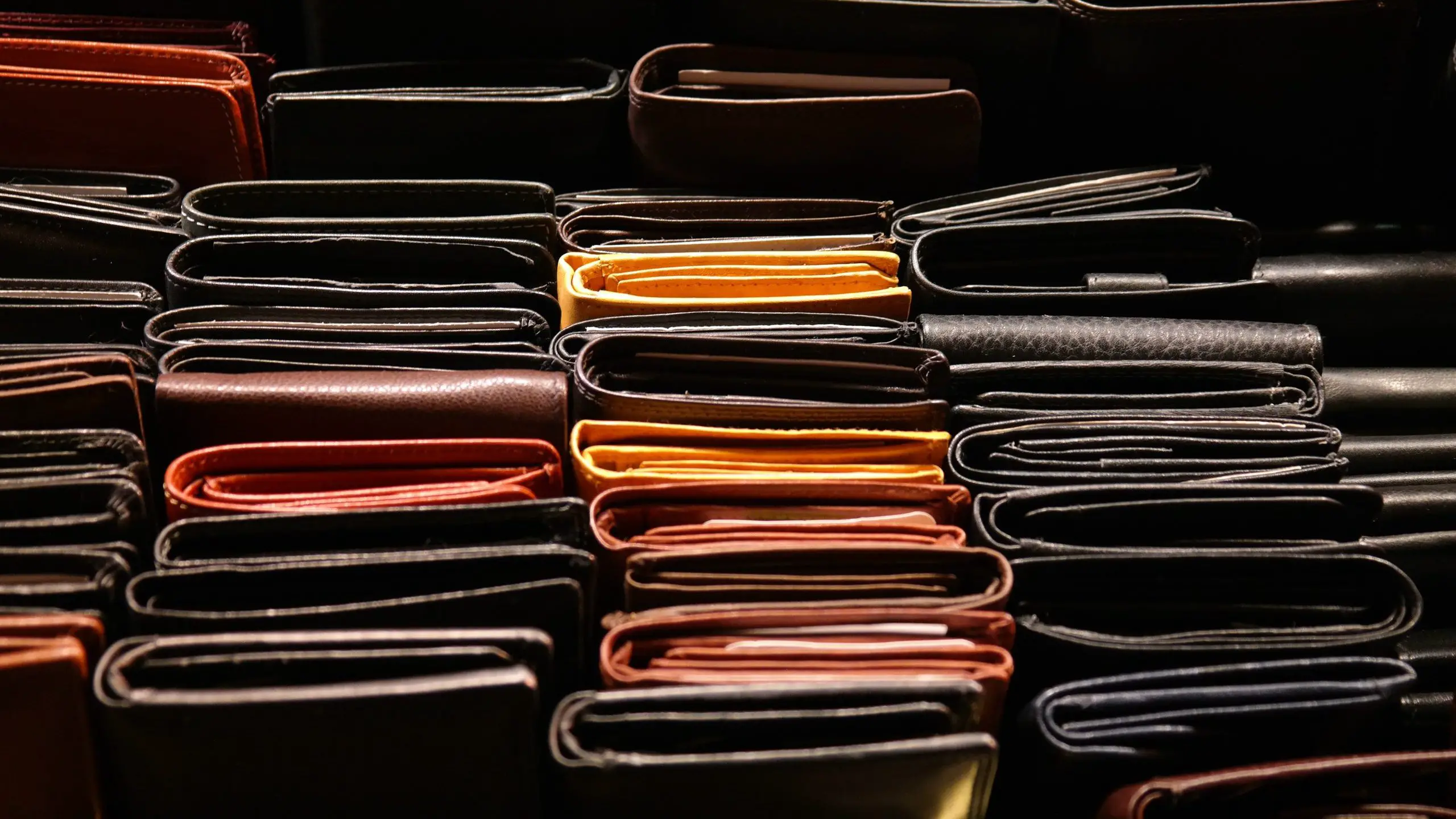 types of wallets for men- image of a stacks of wallets