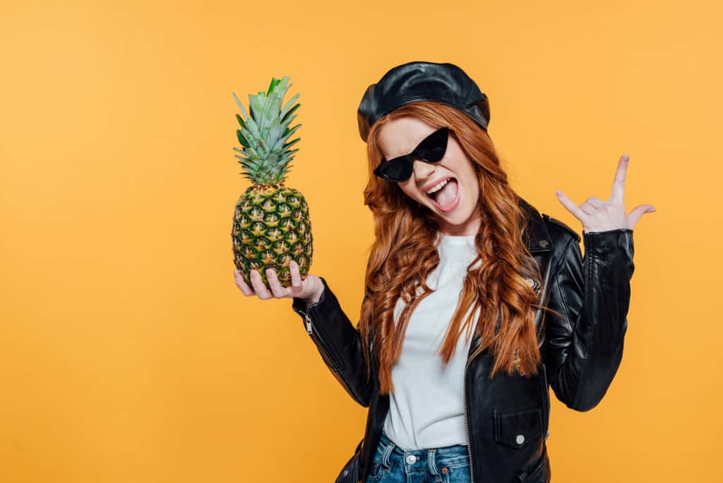 redheaded girl with pineapple leather jacket