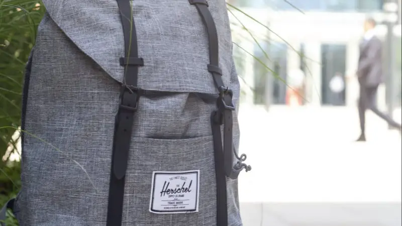 Article: How to Wash a Herschel Backpack Image: Backpack on street