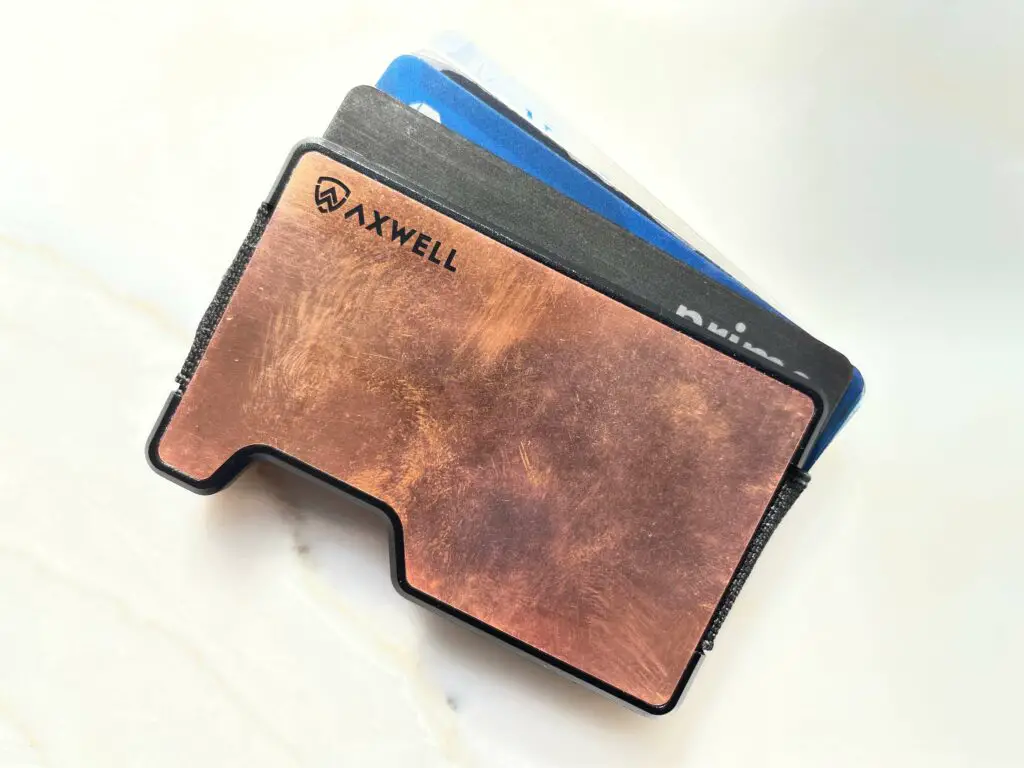 Axwell wallet in copper - cards fanned out