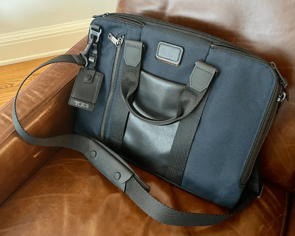 Article: Are Tumi Laptop Bags Worth It? Image shows my Tumi laptop bag on a leather chair